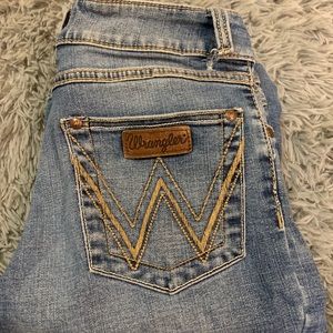 Women’s Mid-rise bootcut wranglers
